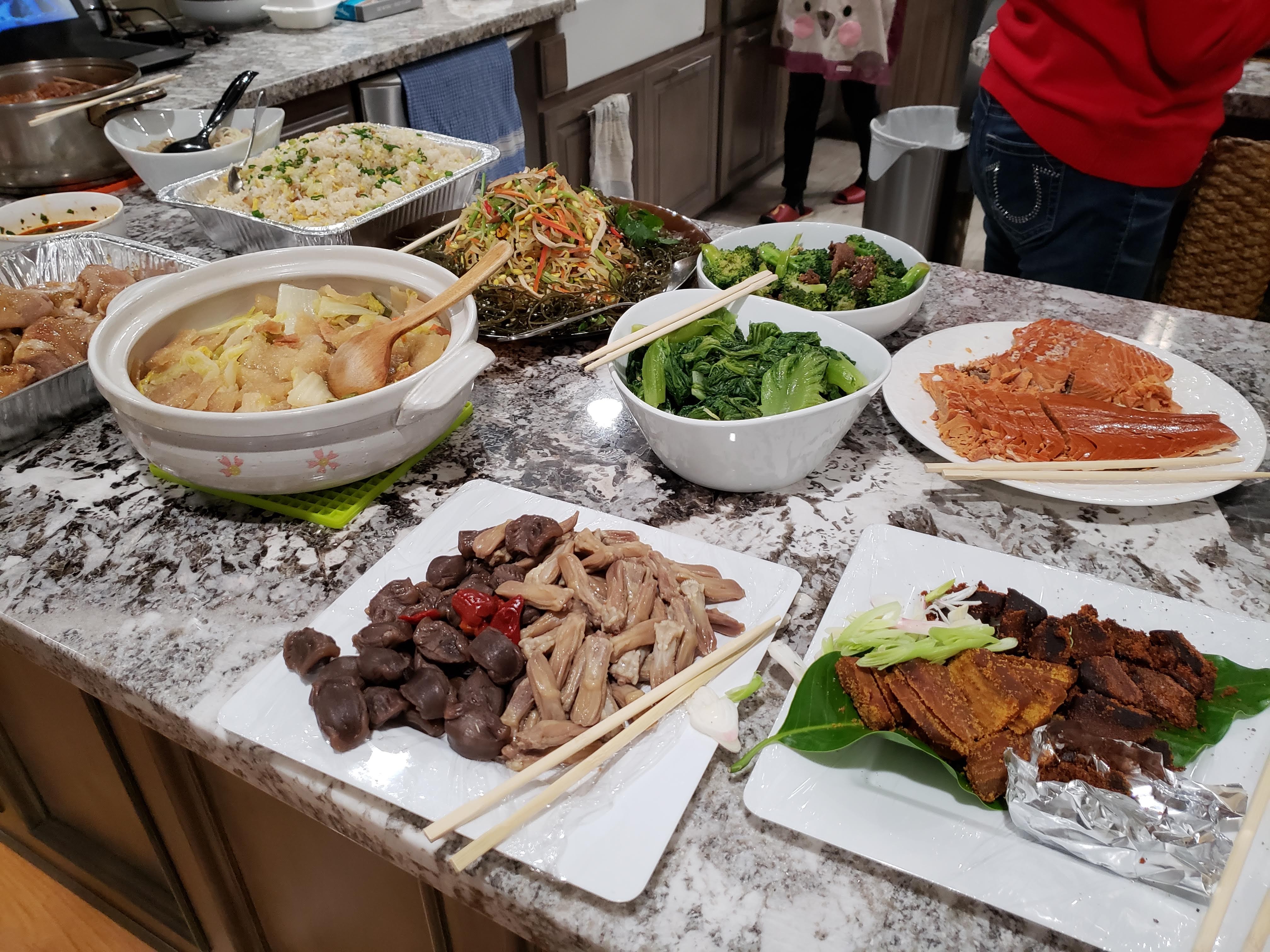 Bowls and plates full of traditional Taiwanese foods