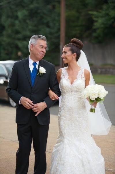 Noelle with her father, Carlos, at her wedding in 2014