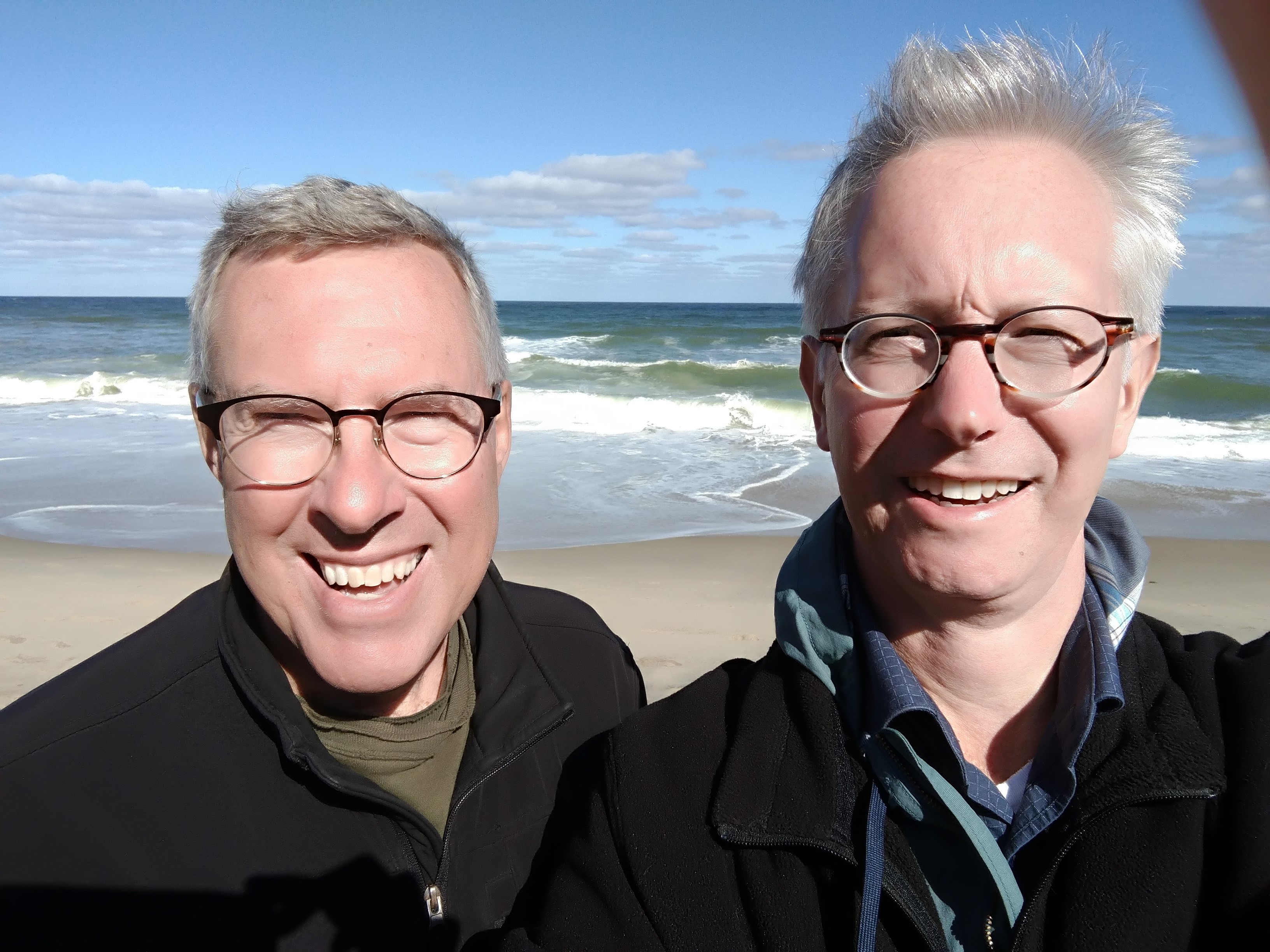 Rob and his husband Chet at the beach